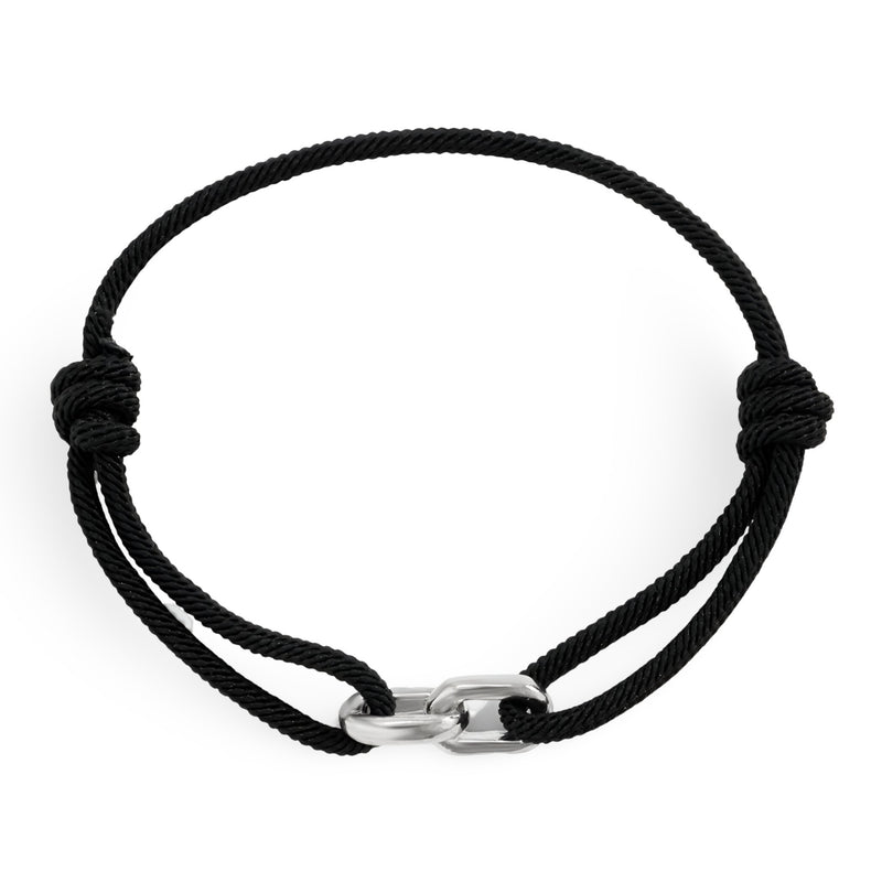 Bracelet cordon noir avec maillons croisés en métal argenté, design minimaliste et élégant.