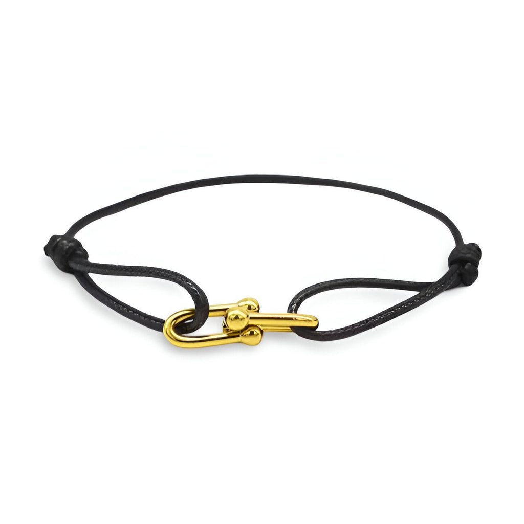 Bracelet cordon noir avec fermoir à maillons dorés croisés modèle Verity.
