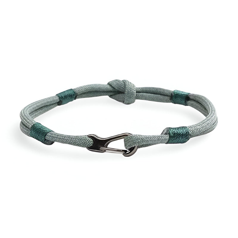 Bracelet cordon turquoise avec nœud et mousqueton métallique noir mat, style Parker pour homme.