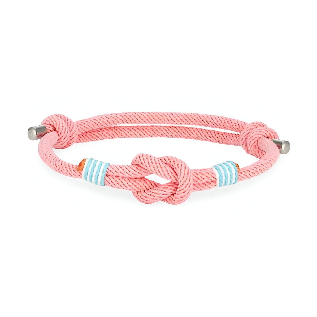 Bracelet cordon rose à nœud central avec rayures bleues claires ajustable.
