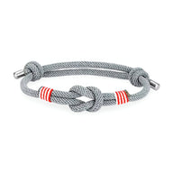 Bracelet cordon gris avec nœuds et rayures rouges, ajustable, modèle Kadeo.