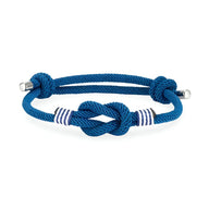 Bracelet cordon bleu marine à nœud central avec rayures blanches et fermoirs métalliques ajustable.