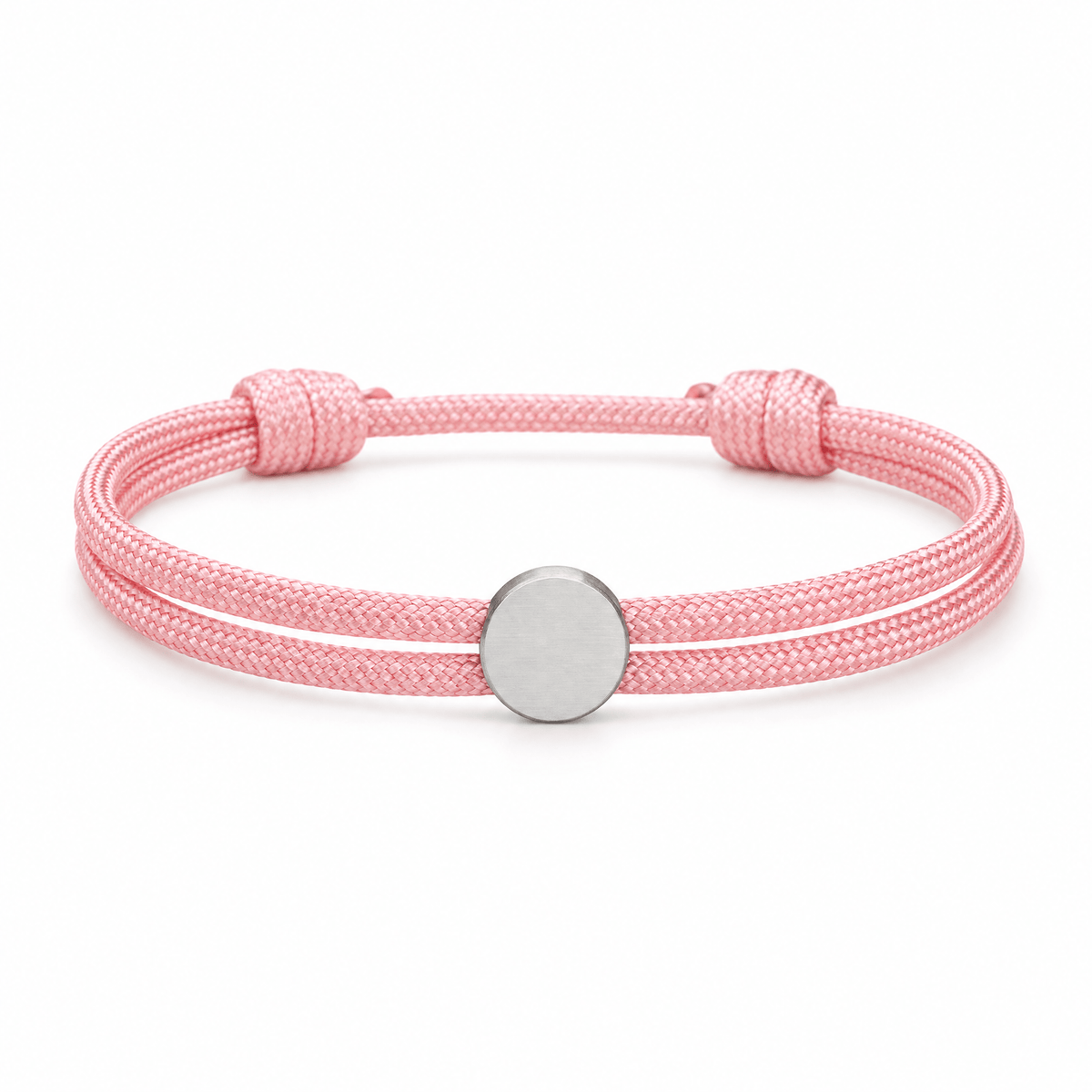 Bracelet Marsin Rose et argent, cordon ajustable et pastille ronde, posé de face sur fond blanc