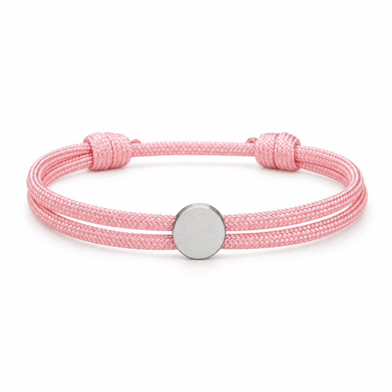 Bracelet Marsin Rose et argent, cordon ajustable et pastille ronde, posé de face sur fond blanc