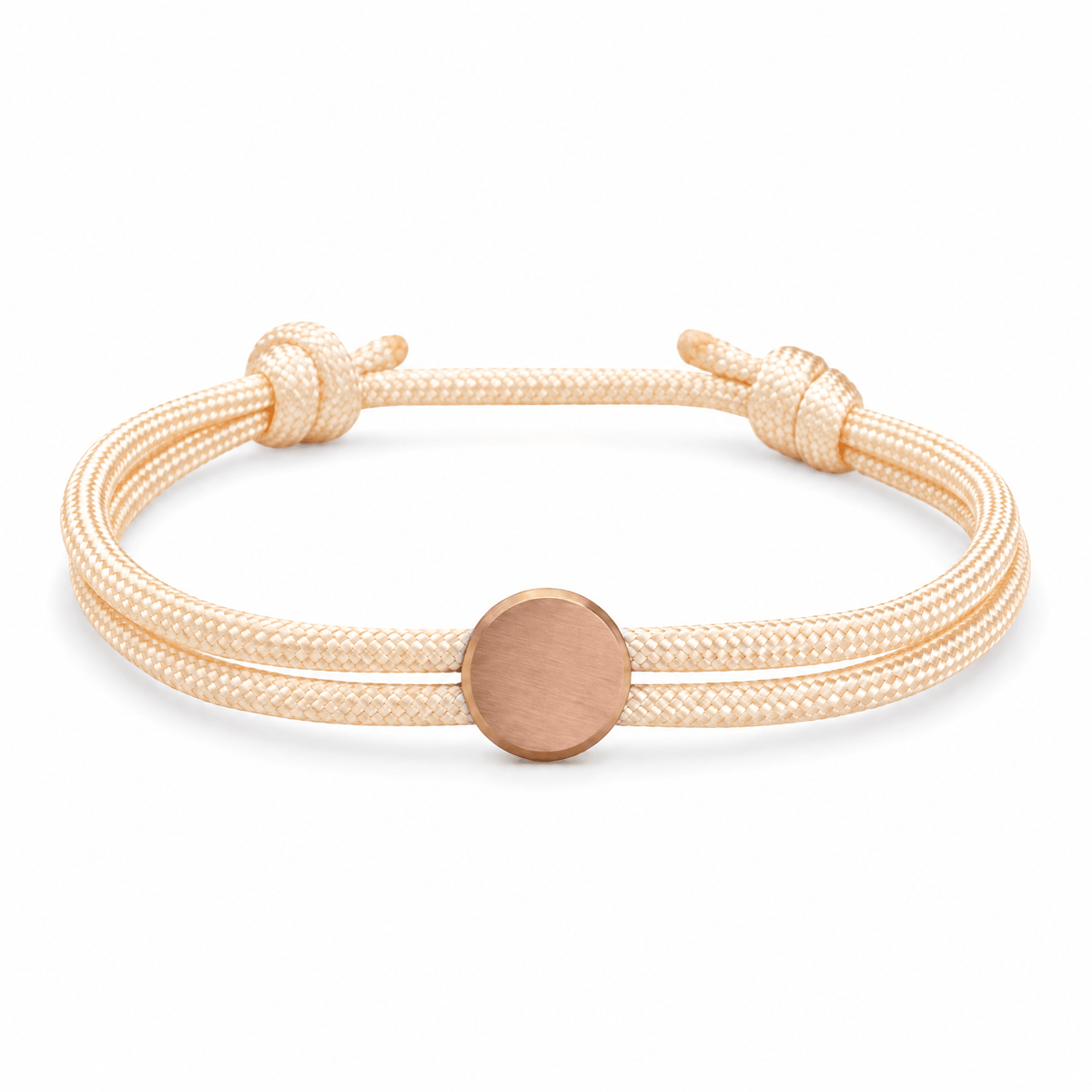 Bracelet Marsin Blanc crème et or rosé, cordon ajustable et pastille ronde, posé de face sur fond blanc