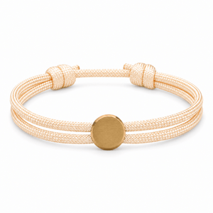 Bracelet Marsin Blanc crème et or, cordon ajustable et pastille ronde, posé de face sur fond blanc