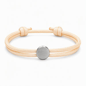 Bracelet Marsin Blanc crème et argent, cordon ajustable et pastille ronde, posé de face sur fond blanc