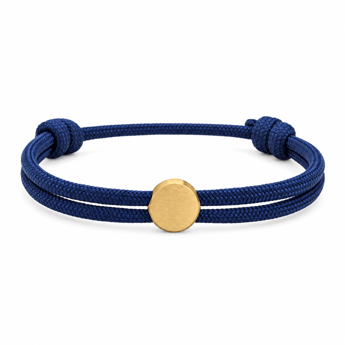 Bracelet Marsin Bleu marine et or, cordon ajustable et pastille ronde, posé de face sur fond blanc