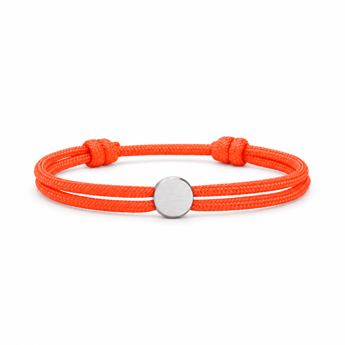 Bracelet Marsin Orange et argent, cordon ajustable et pastille ronde, posé de face sur fond blanc