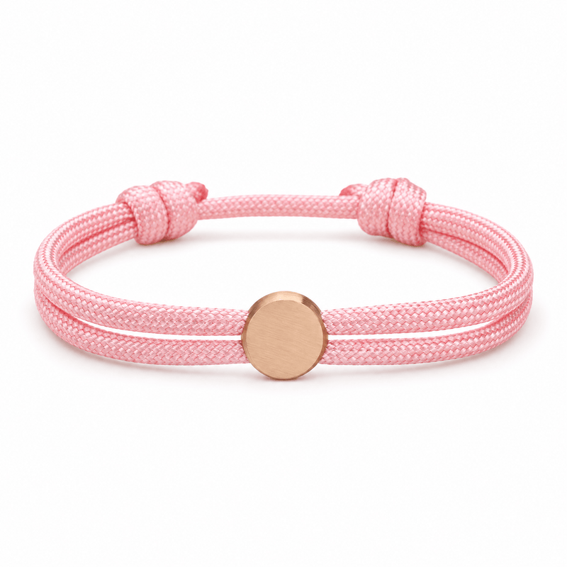 Bracelet Marsin Rose et or rosé, cordon ajustable et pastille ronde, posé de face sur fond blanc