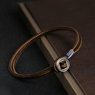 Bracelet cordon marron en argent sterling avec détail bleue et jaune, style Cristiano.