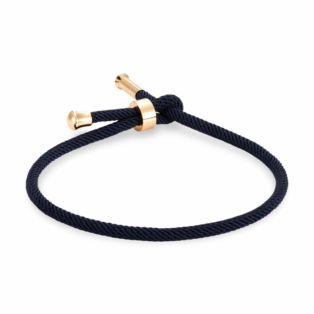 Bracelet cordon bleu marine avec détails en titane plaqué or minimaliste modèle Frémi.