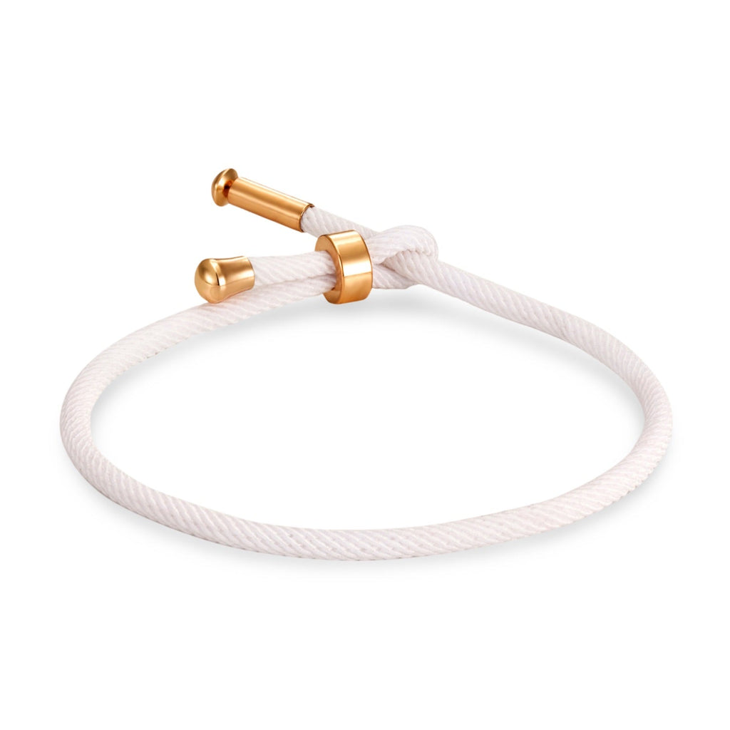 Bracelet cordon blanc avec détails en titane plaqué or minimaliste modèle Frémi.