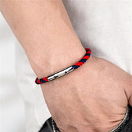 Bracelet cordon tressé bleu et rouge avec fermoir métallique brillant, modèle unisexe Nash.
