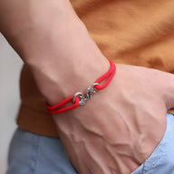 Bracelet cordon rouge avec pendentif dragon argenté, style coulissant pour homme.