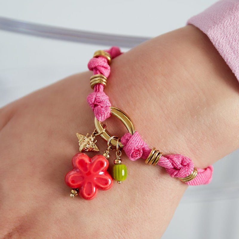 Bracelet cordon d'amour, aux multiples charms dorés, en acier inoxydable, pour femme, modèle Lalama - La Boutique du Bracelet