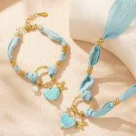 Bracelet cordon d'amour, aux multiples charms dorés, en acier inoxydable, pour femme, modèle Lalama - La Boutique du Bracelet