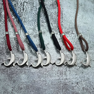 Bracelet cordon pour homme avec pendentif dauphin en métal argenté, variantes couleur rouge, rose, bleu, vert, noir,.