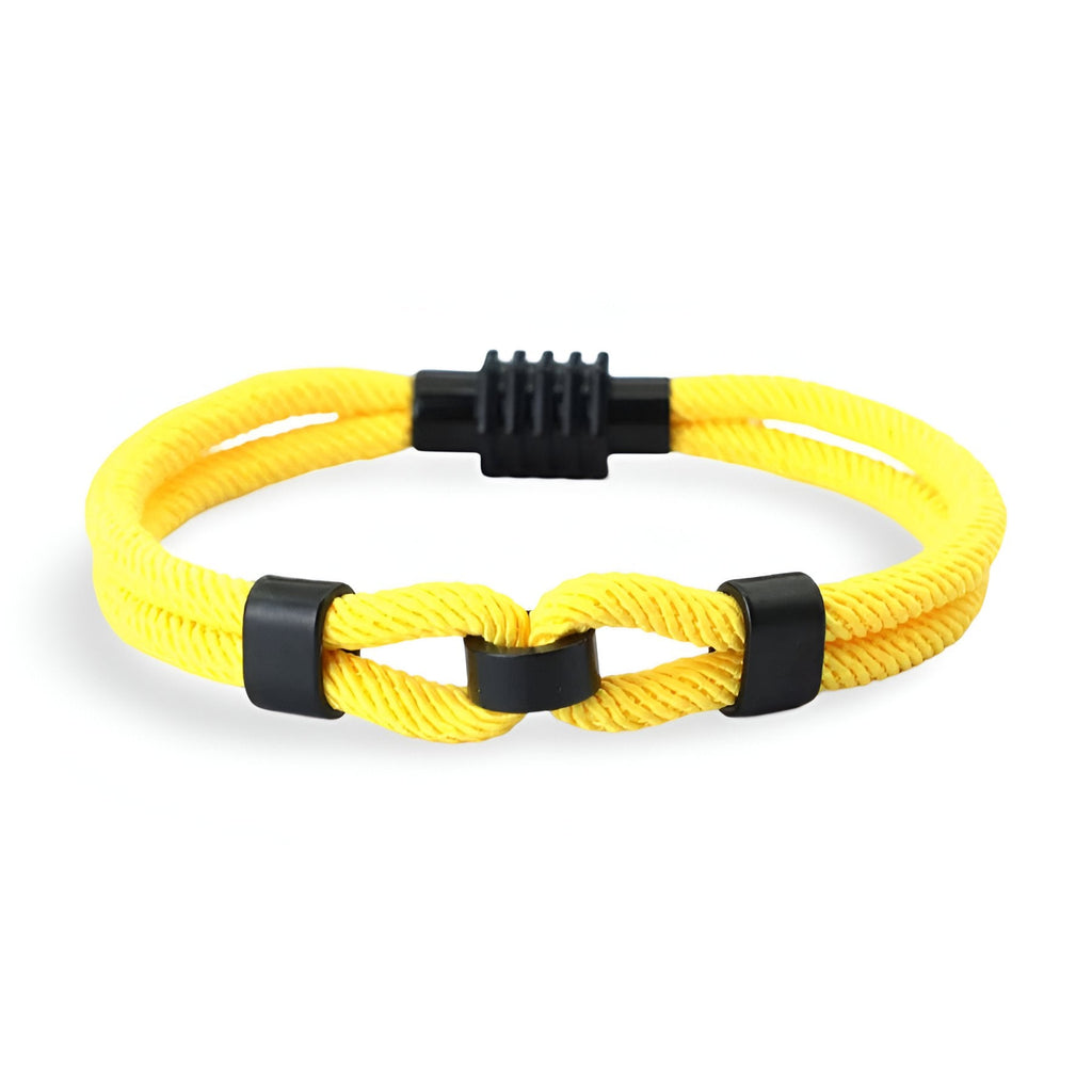 Bracelet cordon double jaune avec nœud central et fermeture noire en plastique.