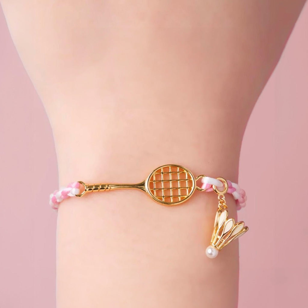 Bracelet cordon rose avec pendentif en acier inoxydable en forme de raquette de badminton et breloque volant.