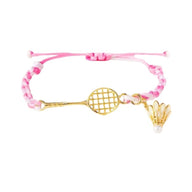 Bracelet cordon rose avec pendentifs en acier inoxydable doré raquette de badminton et volant.
