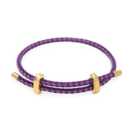 Bracelet cordon violet et rose tressé avec boucles en acier inoxydable doré.