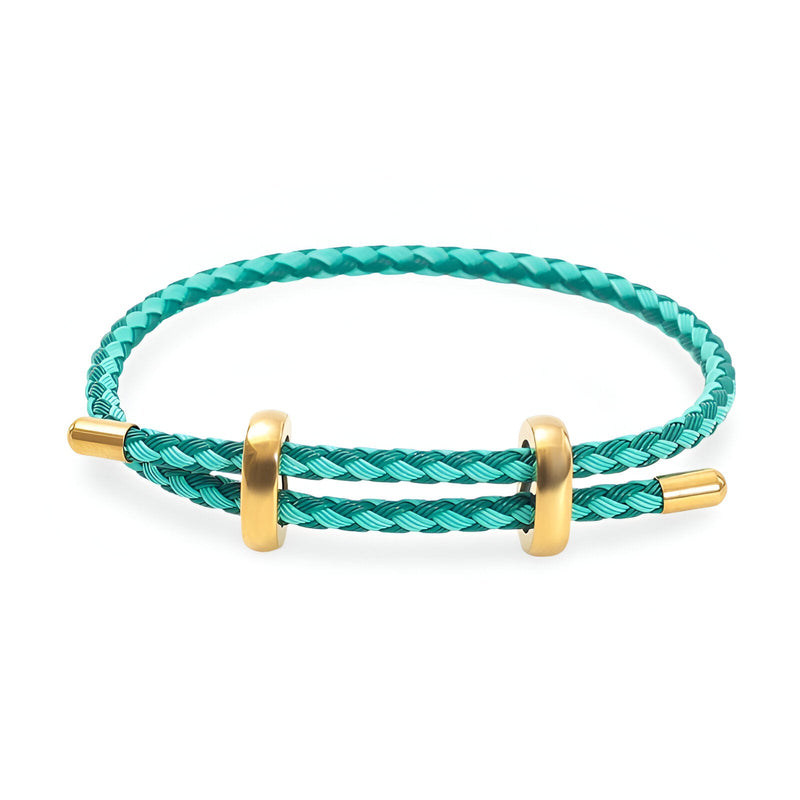 Bracelet cordon tressé turquoise avec accents en acier inoxydable doré, design simple et élégant.
