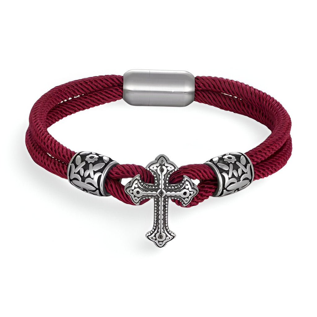 Bracelet cordon bordeaux avec croix chrétienne et détails en acier inoxydable, fermeture magnétique.