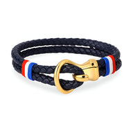 Bracelet cordon cuir bleu marine tressé avec crochet doré et détail drapeau français.