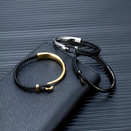 Bracelet cordon cuir noir tressé avec crochet en acier inoxydable or et argent élégant pour homme.