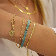 Bracelet cordon bleu tressé orné de perles de verre japonaises, style ajustable, mix polyester-coton.