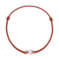 Bracelet cordon rouge avec fer à cheval en acier inoxydable argenté, style porte-bonheur.