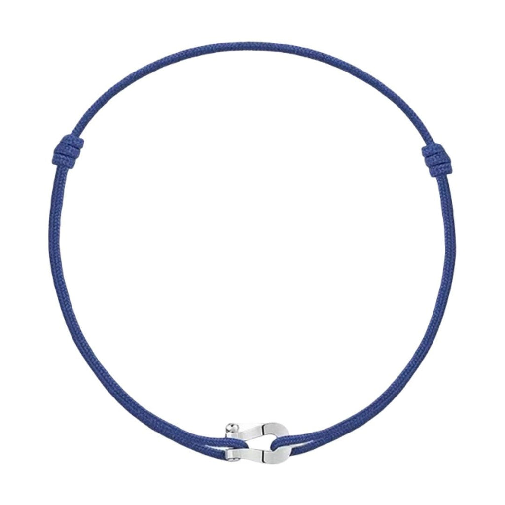 Bracelet cordon bleu avec fer à cheval en acier inoxydable argenté, style porte-bonheur.