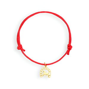 Bracelet cordon rouge avec pendentif fer à cheval en acier inoxydable doré pour femme.