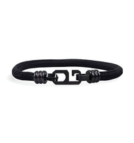 Bracelet cordon noir pour homme avec fermoir métal noir style géométrique Wynn.