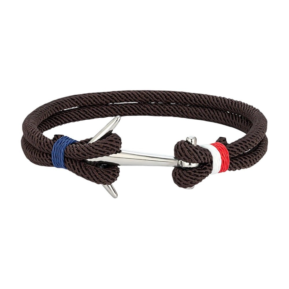 Bracelet cordon marin marron avec ancre en acier inoxydable et détails rouge et bleu.