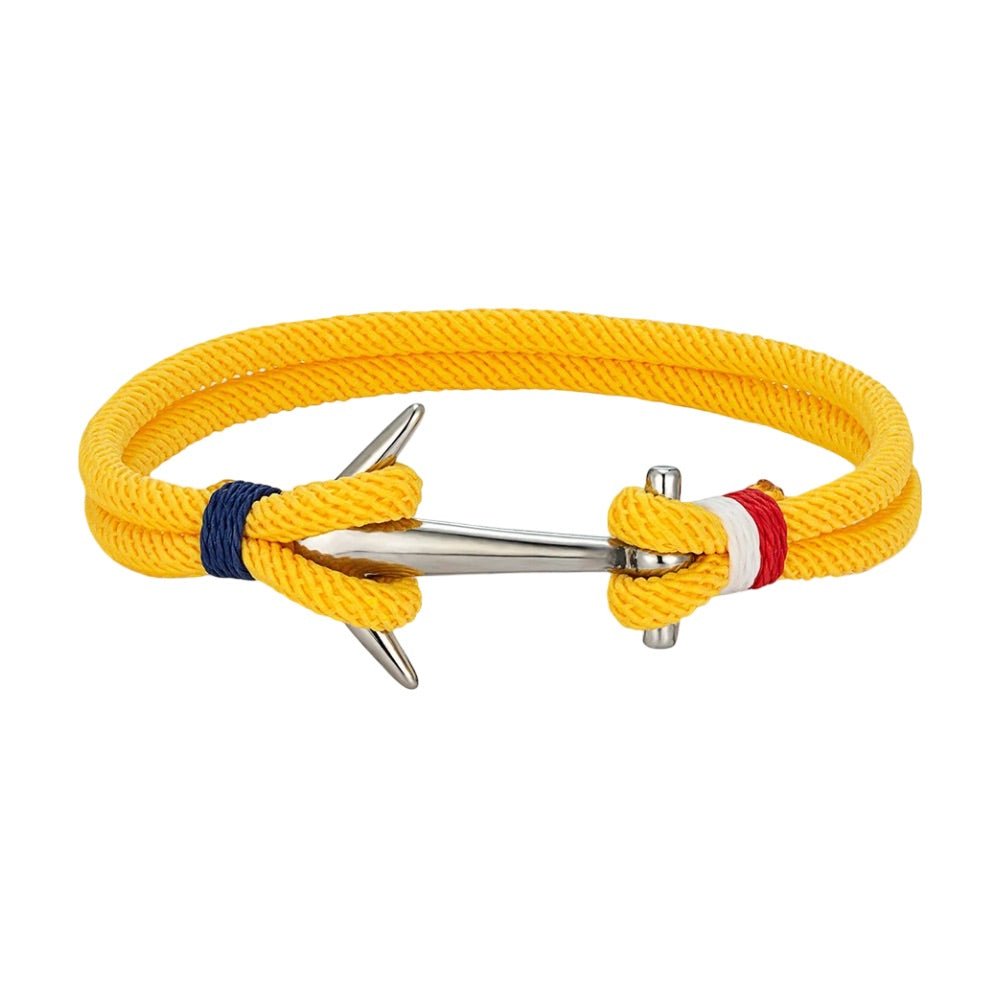 Bracelet cordon marin jaune avec ancre en acier inoxydable et détails bleu et rouge.