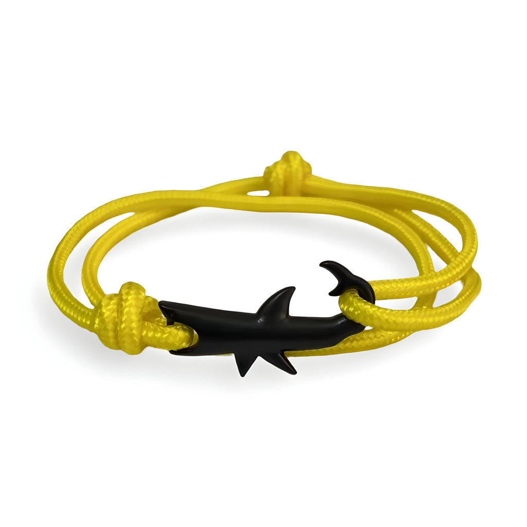 Bracelet cordon jaune avec motif requin noir en acier, modèle Bruce, style moderne et épuré.