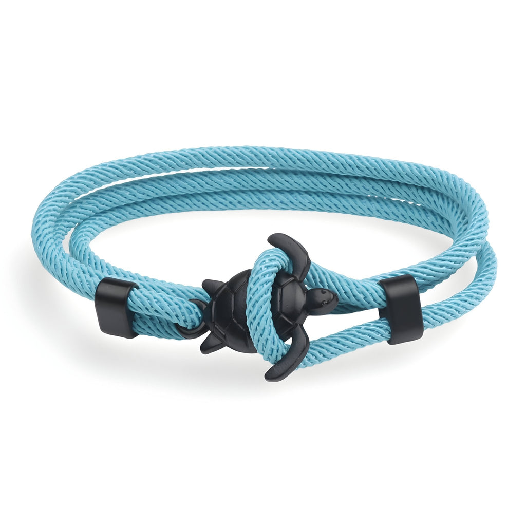 Bracelet cordon turquoise double tour avec motif tortue noir en métal.