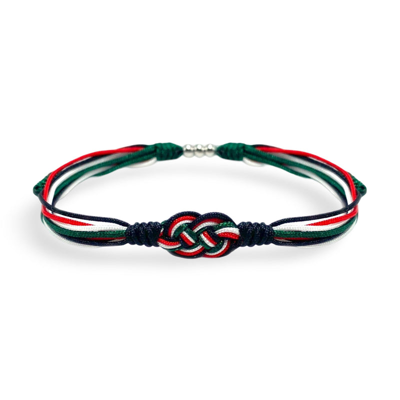 Bracelet cordon tricolore à nœud décoratif aux couleurs rouge, vert, blanc et noir, style Clove.