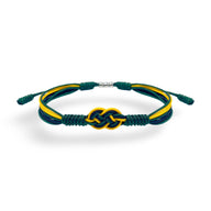 Bracelet cordon vert avec nœud complexe et fils jaune et noir inspiré du drapeau de la Jamaïque.