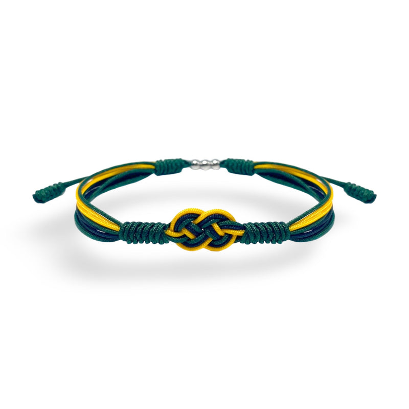 Bracelet cordon vert avec nœud complexe et fils jaune et noir inspiré du drapeau de la Jamaïque.