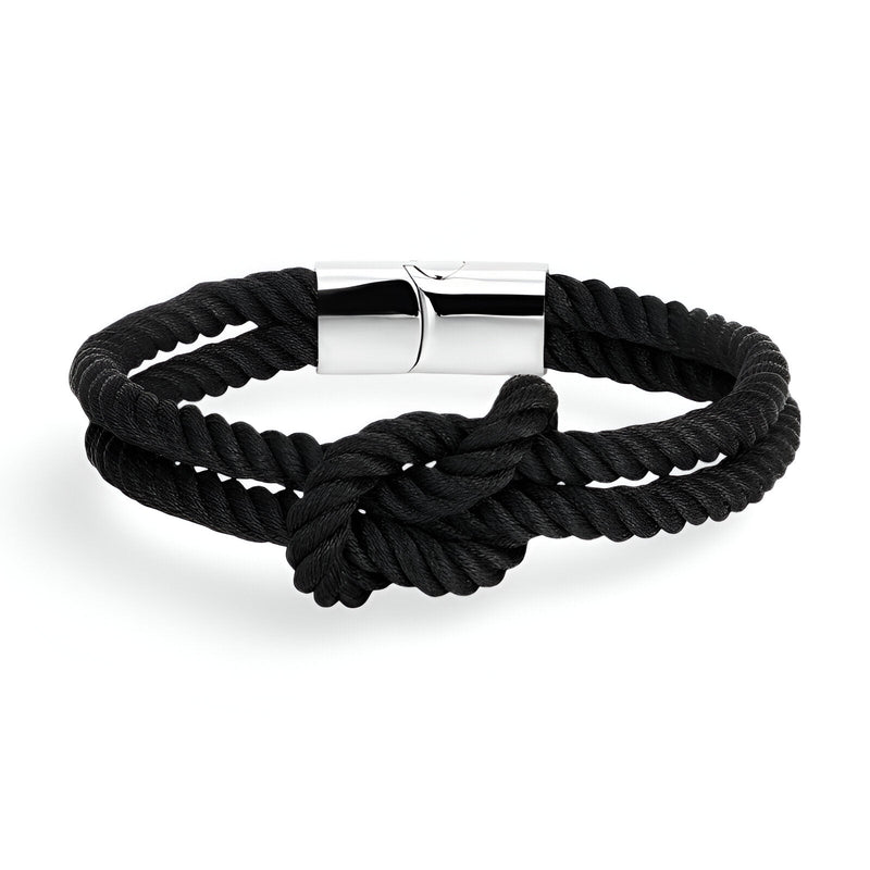 Bracelet cordon noir épais avec nœud central et fermoir métallique argenté lisse.