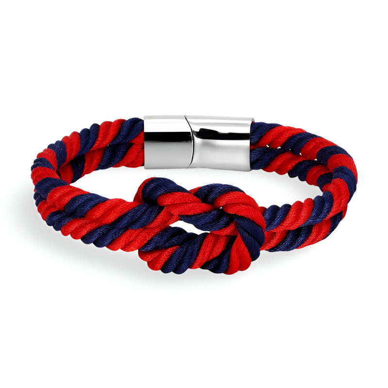 Bracelet cordon épais bleu et rouge avec nœud et fermoir métallique argenté brillant.