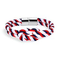 Bracelet cordon épais bleu blanc rouge avec nœud et fermoir métallique argenté.