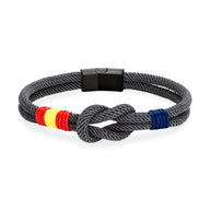 Bracelet cordon noir avec noeud central, drapeau espagnol tissé en rouge, jaune et bleu, fermoir magnétique noir mat.