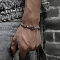 Bracelet cordon gris avec noeud en argent sterling 925, style minimaliste ajustable.