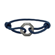 Bracelet cordon bleu marine avec ornement hexagone en acier inoxydable ajustable.