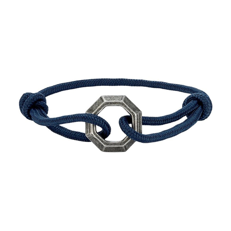Bracelet cordon bleu marine avec ornement hexagone en acier inoxydable ajustable.