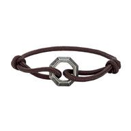 Bracelet cordon marron avec ornement hexagone en acier inoxydable, modèle Nino, ajustable.